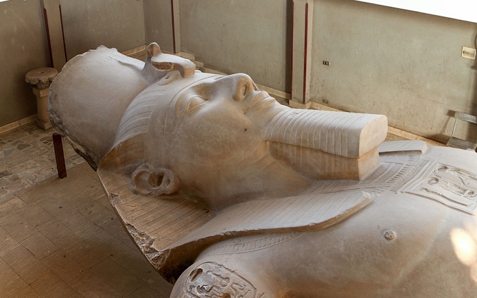 Ramses II statue lying in Memphis, Egypt museum.