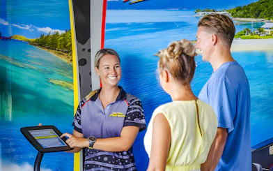 Tourists receiving jetski tour information from a guide in Whitsundays.