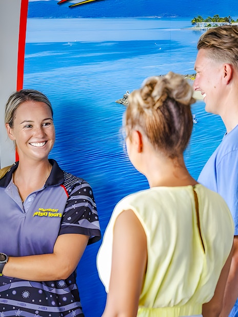 Tourists receiving jetski tour information from a guide in Whitsundays.