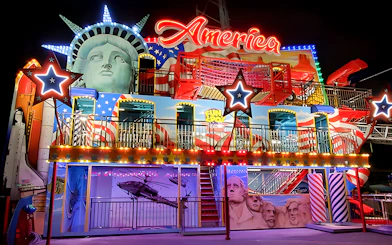 Fun Spot America Theme Park facade with Statue of Liberty and Mount Rushmore elements.
