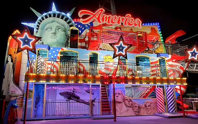 Fun Spot America Theme Park facade with Statue of Liberty and Mount Rushmore elements.