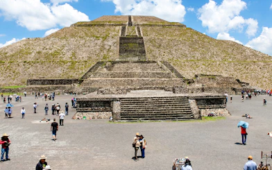 Teotihuacán Pyramid of the Sun with tourists exploring the site, Mexico.