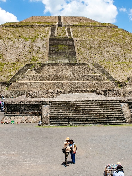 Teotihuacán Pyramid of the Sun with tourists exploring the site, Mexico.