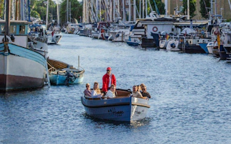 Guests on a guided boat tour in Copenhagen harbor.