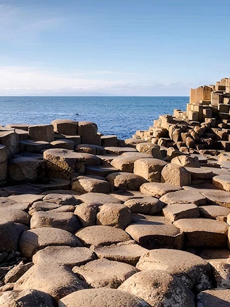 Giant's Causeway basalt columns by the sea in Northern Ireland.