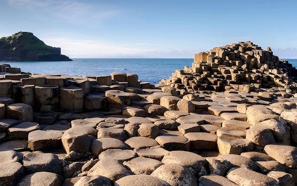 Giant's Causeway basalt columns by the sea in Northern Ireland.
