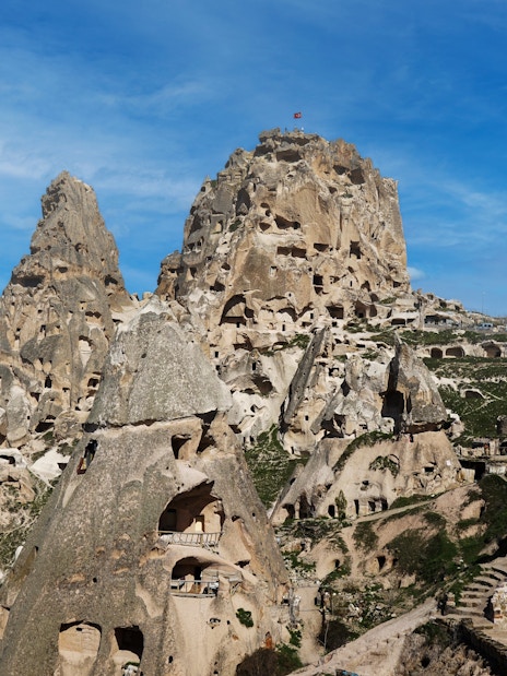 Rock formations and cave dwellings near Kaymakli Underground City, Cappadocia, Turkey.