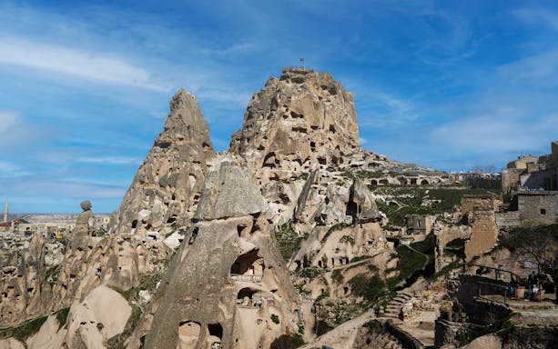 Rock formations and cave dwellings near Kaymakli Underground City, Cappadocia, Turkey.