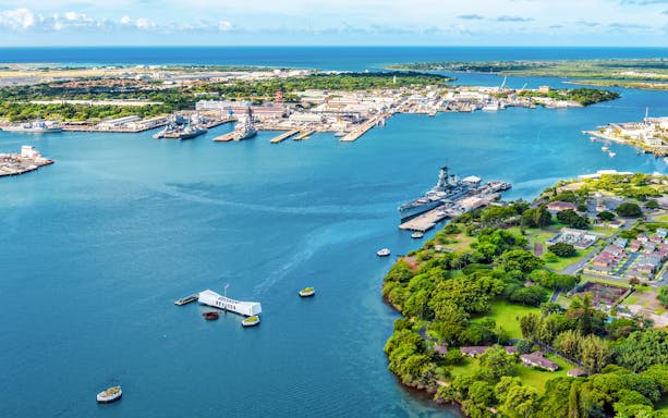 Aerial view of USS Arizona and USS Missouri Memorials at Pearl Harbor, Hawaii.