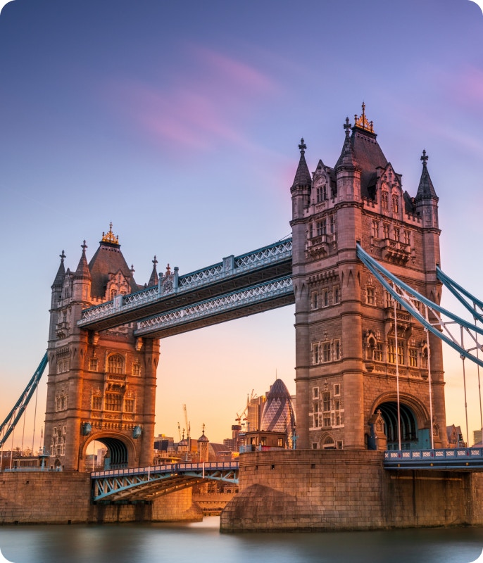 London cityscape with iconic landmarks including the Tower Bridge and the River Thames.