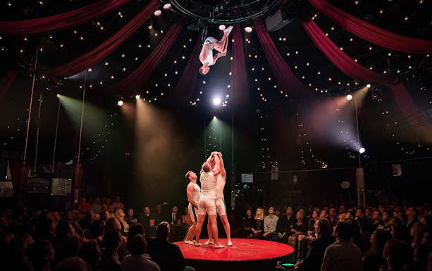 Acrobats performing in a circus tent during the Absinthe show in Las Vegas.