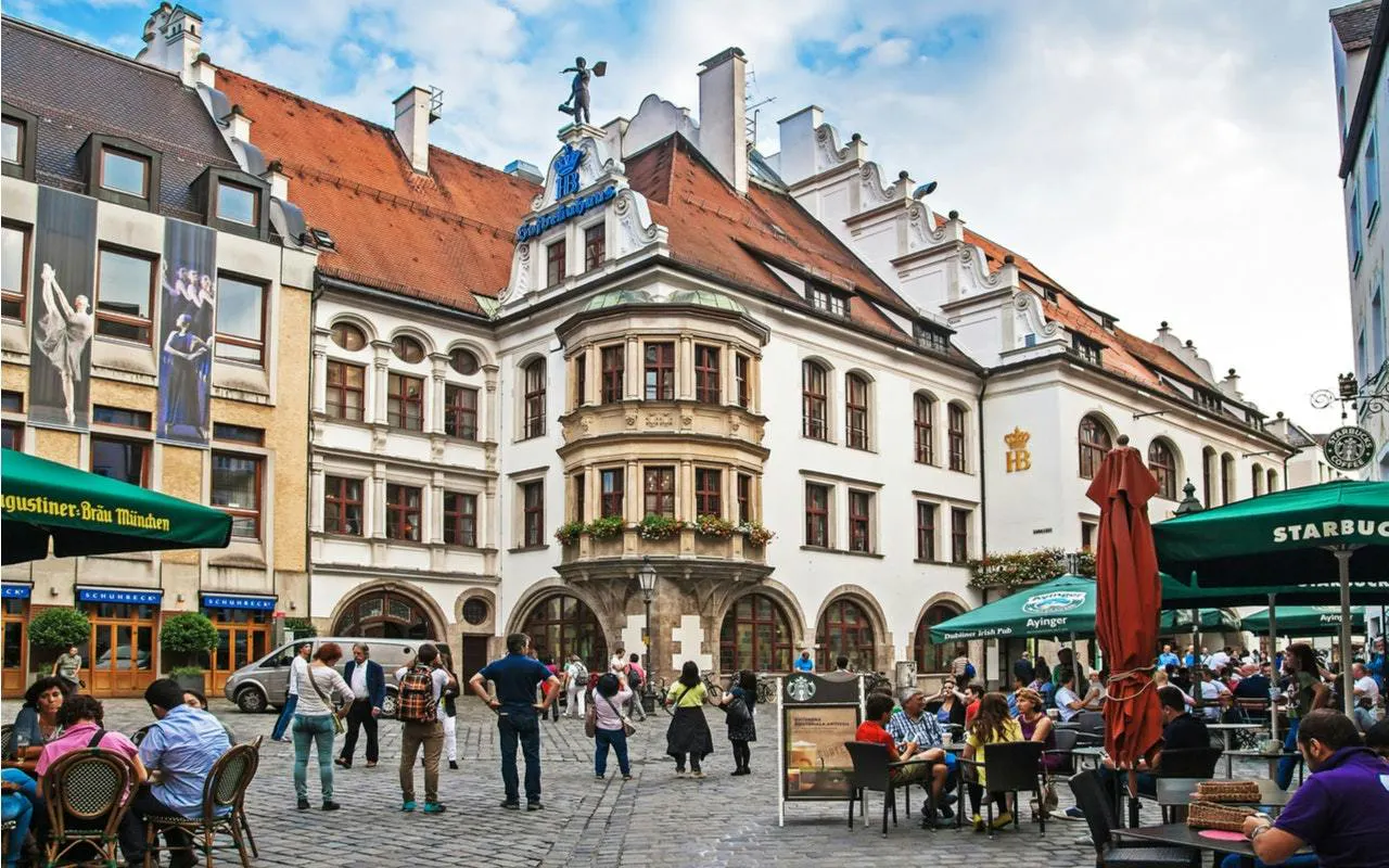 Hofbräuhaus beer hall exterior with people in Munich, part of self-guided city exploration game.