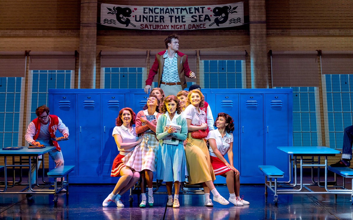 Cast performing "Back to the Future" musical scene at Enchantment Under the Sea dance.