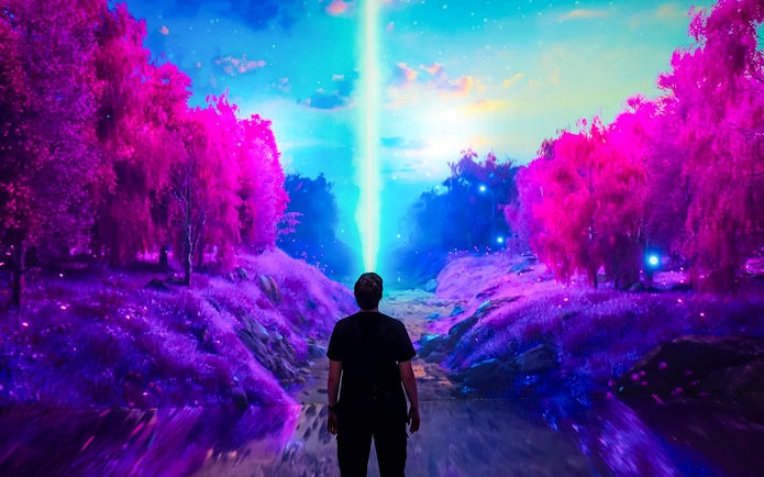 Guests viewing digital art installation at ARTECHOUSE New York.