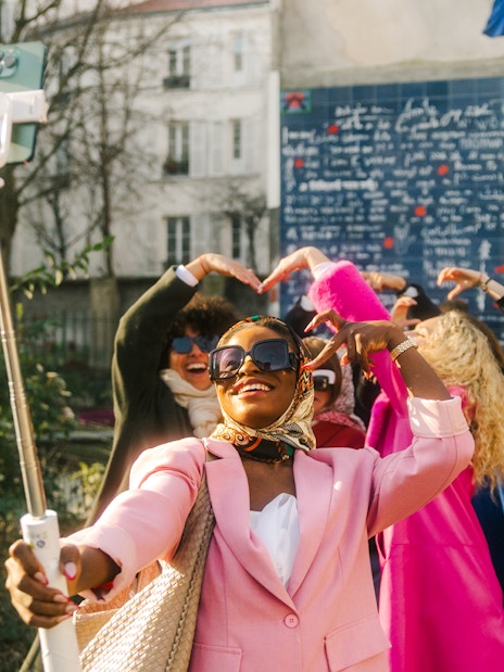 Selfie at Montmartre's "I Love You Wall" during Emily in Paris tour.