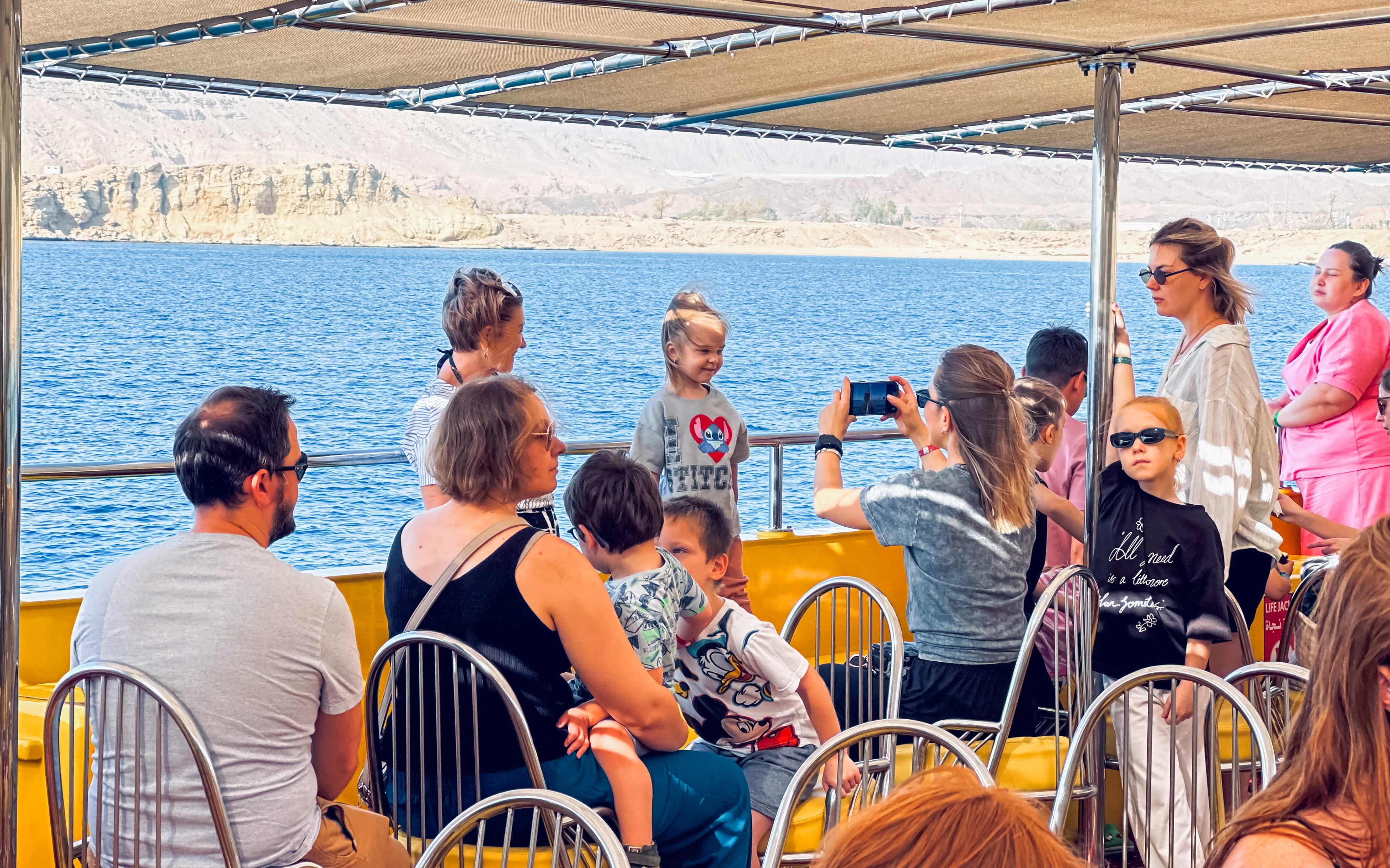 People enjoying the view on Royal Seascope Submarine, Hurghada.