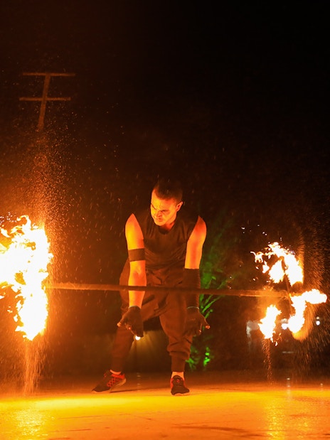 Fire performer at Arabian Dunes Safari Bedouin Camp, Dubai.