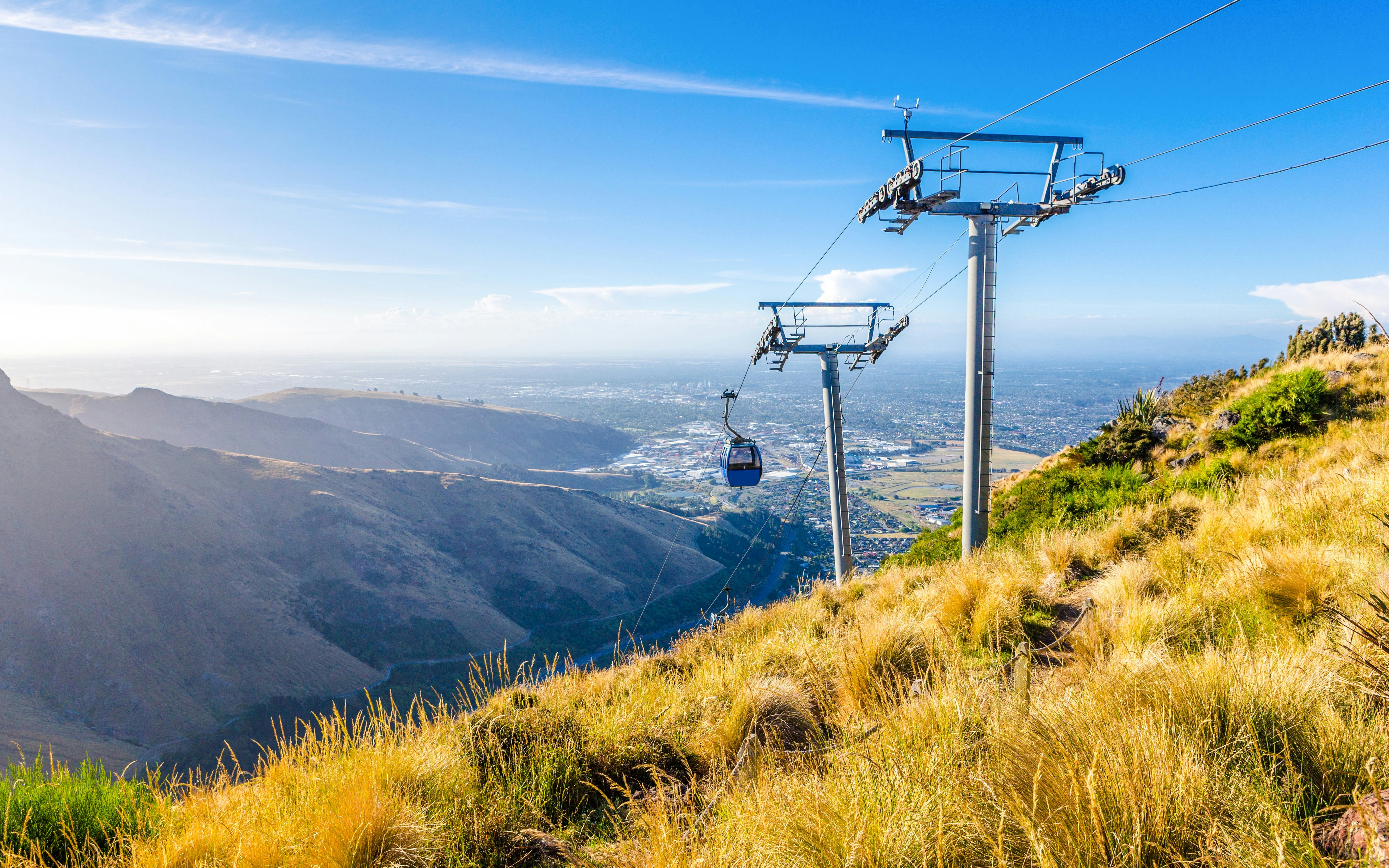 Gondola ride over hills with city view, Christchurch.