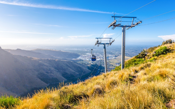 Gondola ride over hills with city view, Christchurch.