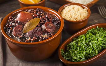 Feijoada with black beans and sausage, part of Rio de Janeiro food tour.