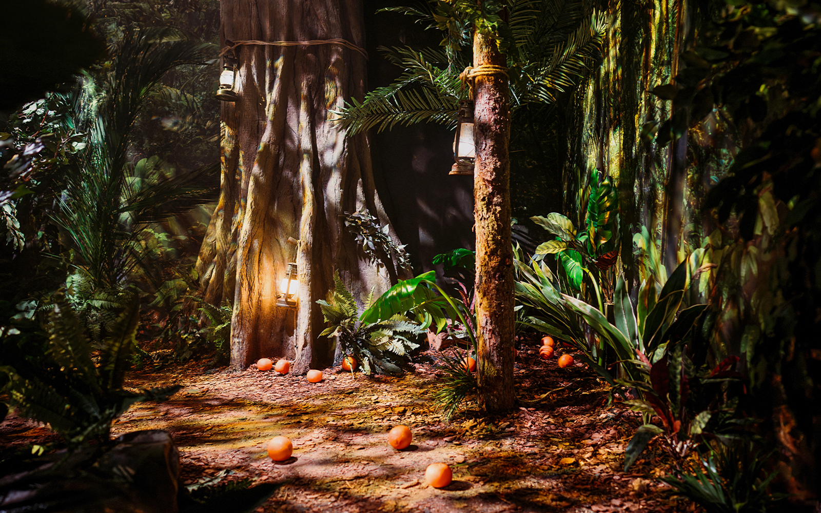 Peru-themed jungle setup with lanterns and oranges at Paddington Bear Experience, London.