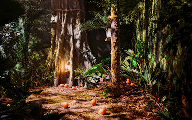 Peru-themed jungle setup with lanterns and oranges at Paddington Bear Experience, London.