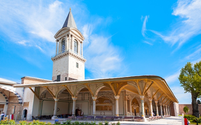 Topkapi Palace exterior with tower and arches, Istanbul, Turkey.