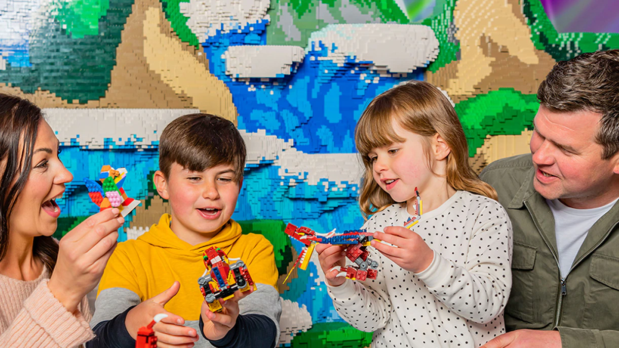 Guests building with Lego bricks at Legoland Windsor.