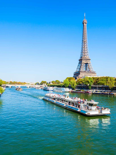Seine River lunch cruise with Eiffel Tower view in Paris.
