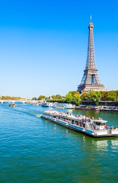 Seine River lunch cruise with Eiffel Tower view in Paris.