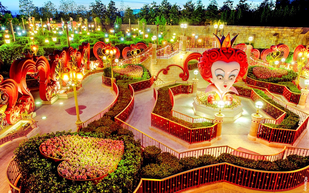 Queen of Hearts maze at Shanghai Disney with illuminated pathways and topiary designs.
