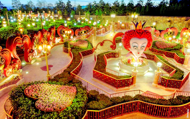 Queen of Hearts maze at Shanghai Disney with illuminated pathways and topiary designs.