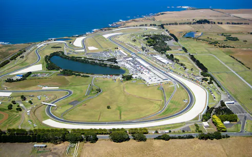 Aerial view of the Grand Prix circuit on Phillip Island, Australia, near the coastline.