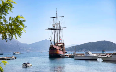 Karaka ship docked with Elaphite Islands in the background.