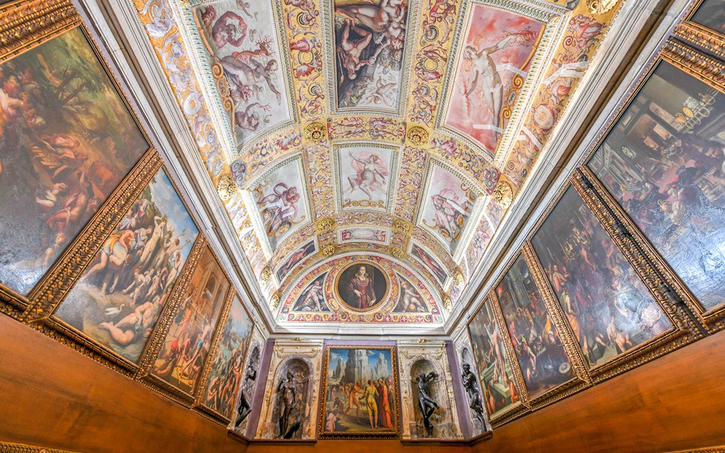 Palazzo Vecchio's ornate Renaissance ceiling and frescoes in Florence, Italy.