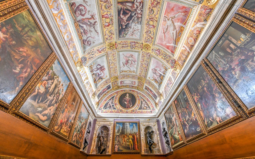 Palazzo Vecchio's ornate Renaissance ceiling and frescoes in Florence, Italy.