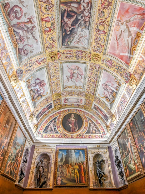 Palazzo Vecchio's ornate Renaissance ceiling and frescoes in Florence, Italy.