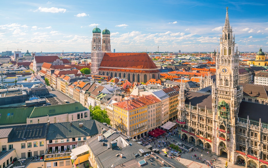 Munich skyline featuring Marienplatz town hall and Frauenkirche in the background.