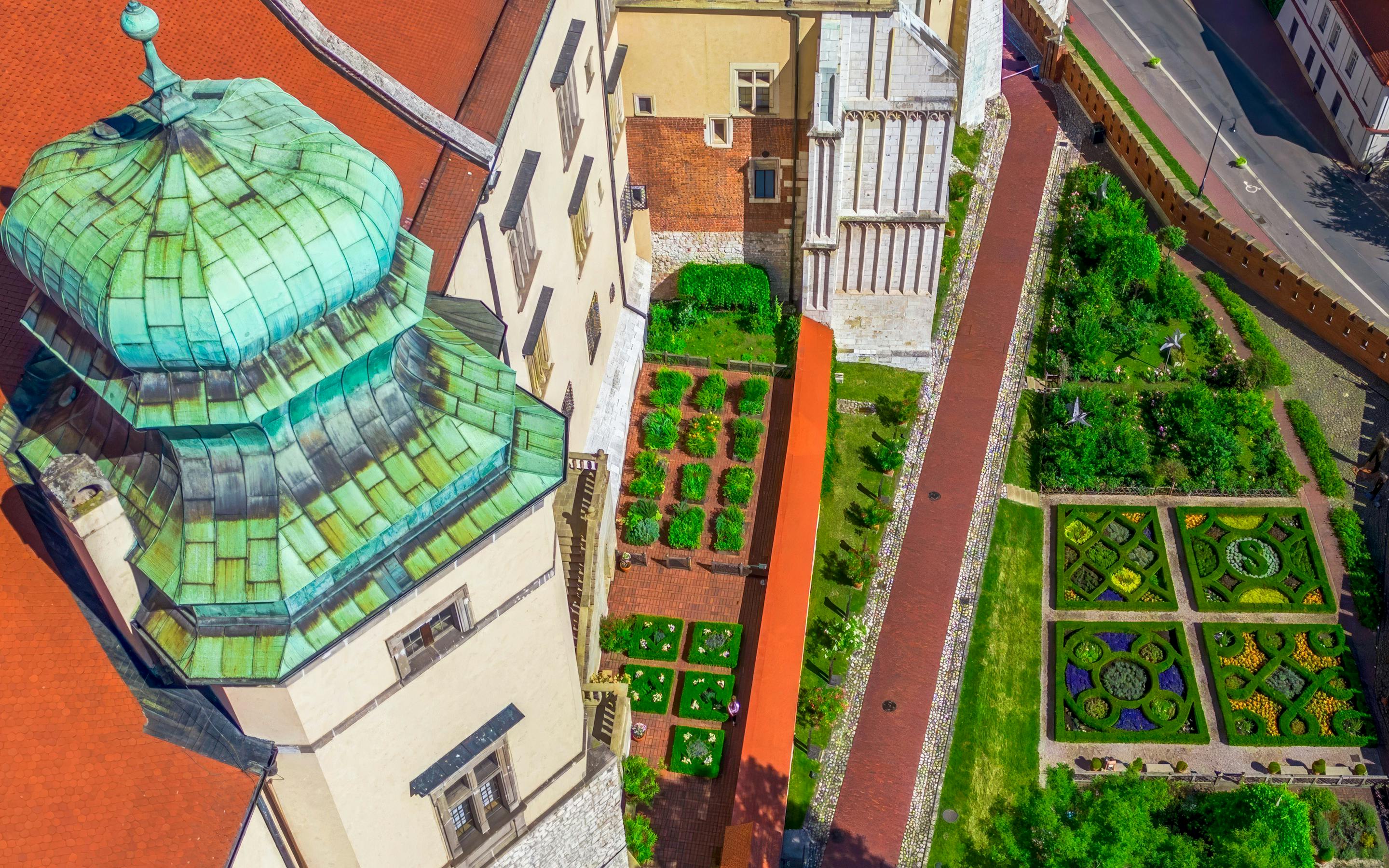 Aerial view of Royal Gardens at Wawel Castle, Kraków, Poland, showcasing geometric plant designs.