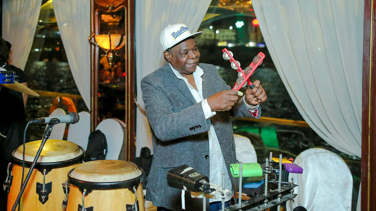 Musician playing percussion on a Nile dinner cruise.