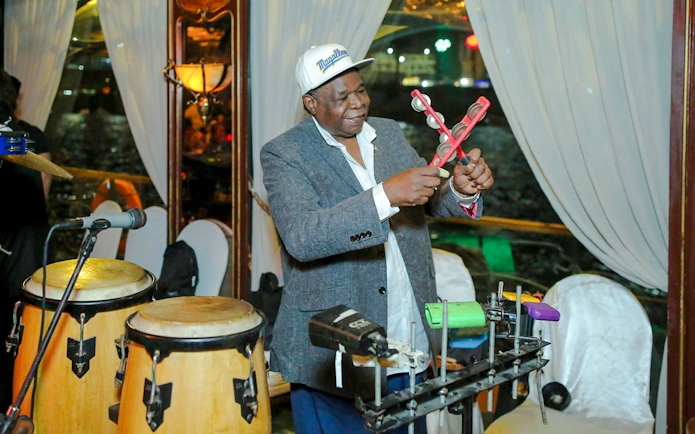Musician playing percussion on a Nile dinner cruise.