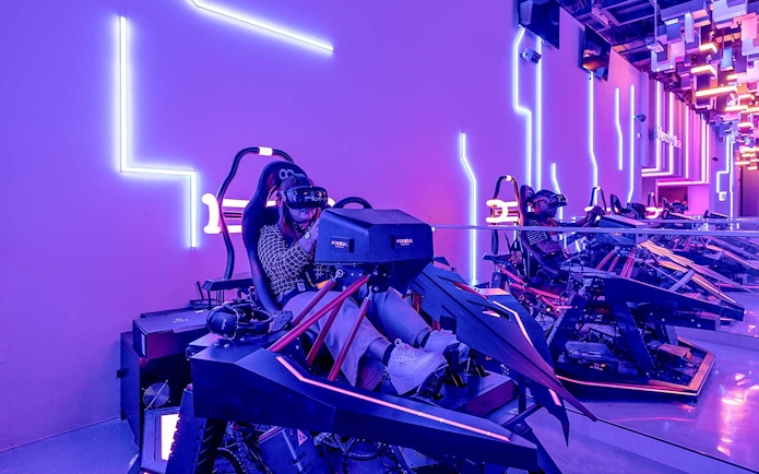 Visitors enjoying virtual reality simulators at Al Qana, Abu Dhabi.