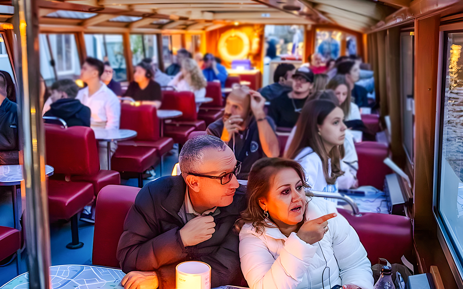 Couple enjoying a scenic view on the Happy Holidays Evening Cruise.