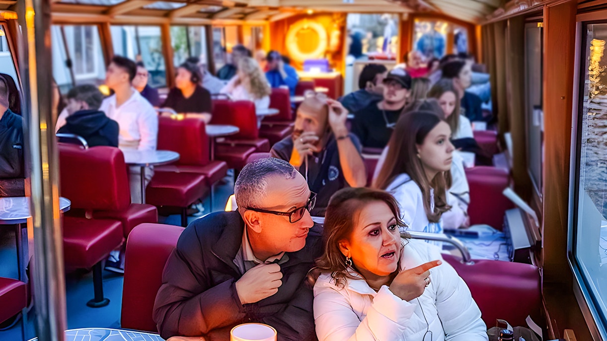 Couple enjoying a scenic view on the Happy Holidays Evening Cruise.