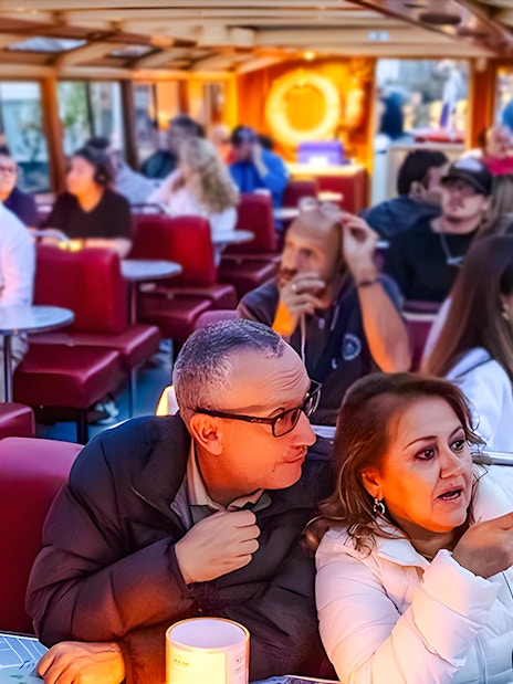 Couple enjoying a scenic view on the Happy Holidays Evening Cruise.