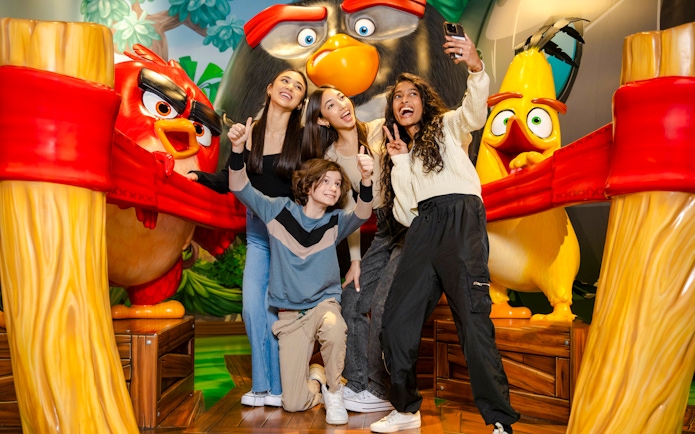 Guests taking a selfie at Angry Birds Mini Golf, American Dream Nickelodeon Universe.