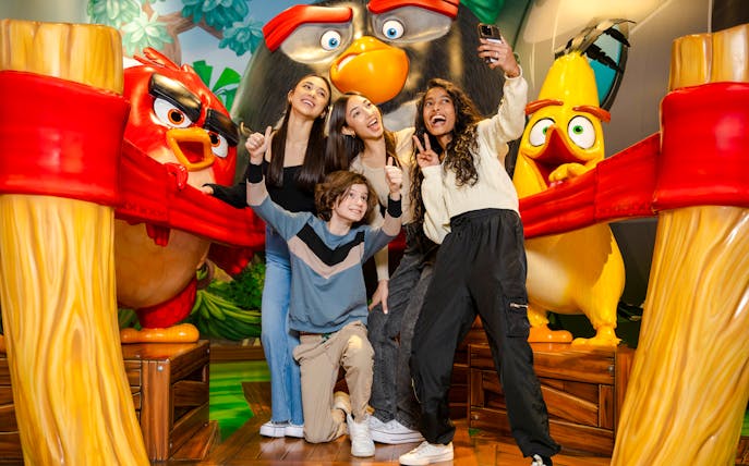 Guests taking a selfie at Angry Birds Mini Golf, American Dream Nickelodeon Universe.