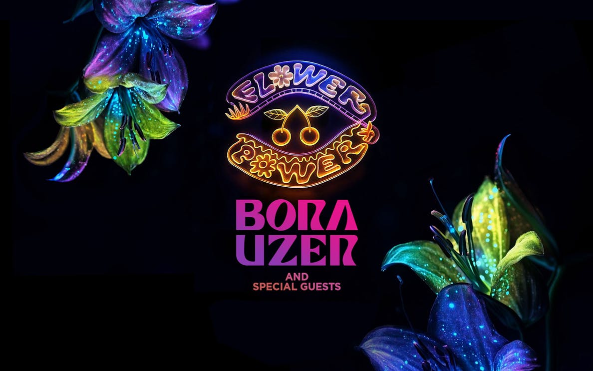 Neon sign with "Flower Power" and colorful flowers for Pacha's Saturday event featuring Bora Uzer.