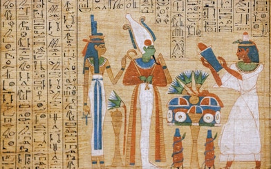 Ancient Egyptian hieroglyphs and deities depicted in Luxor Temple Valley of the Kings interior.