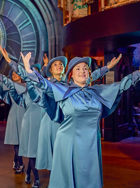 Performers in blue costumes at Triwizard Tournament, Warner Bros. Studio Tour London.